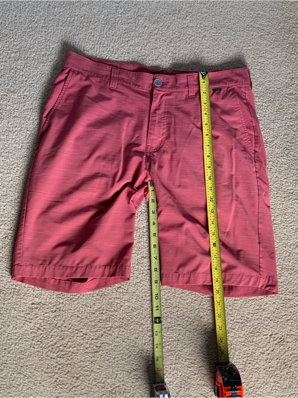 Men's Travis Mathew Coral Pink Casual Shorts.
